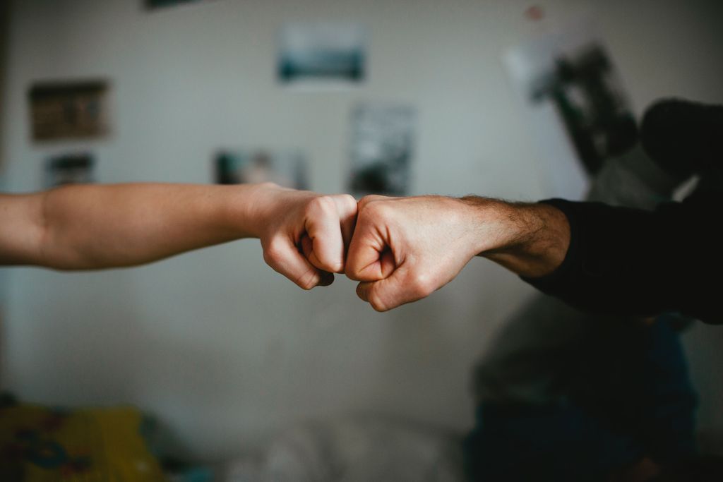 two fists punch with a blurred background